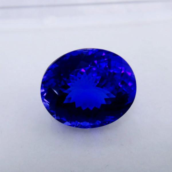 供應(yīng)15.2克拉火彩美麗橢圓形坦桑石 坦桑石一克拉的價(jià)格